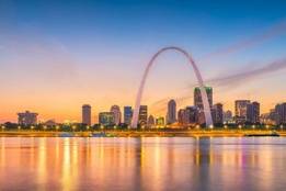 Downtown St. Louis Missouri over the river with arch in the distance